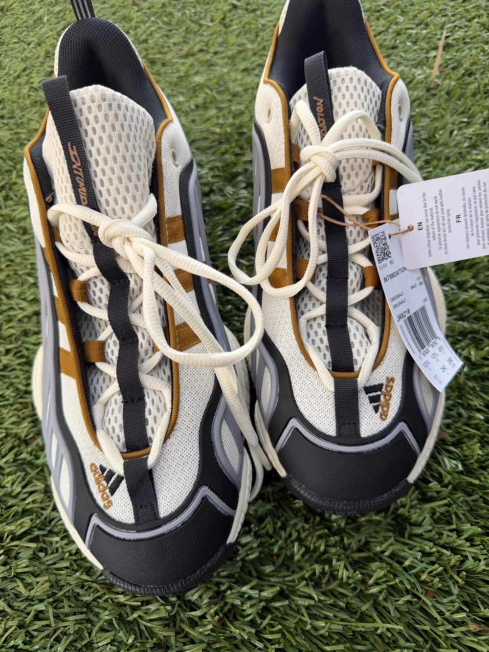 adidas Ivory, Black & Gold Trail-Inspired Sneakers